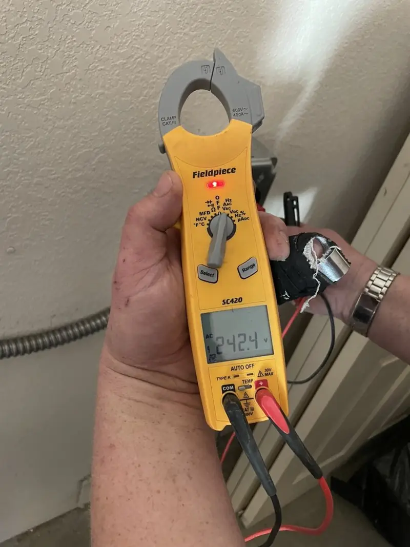 Voltage testing with clamp meter during Circuit Breaker Repair in Claremont